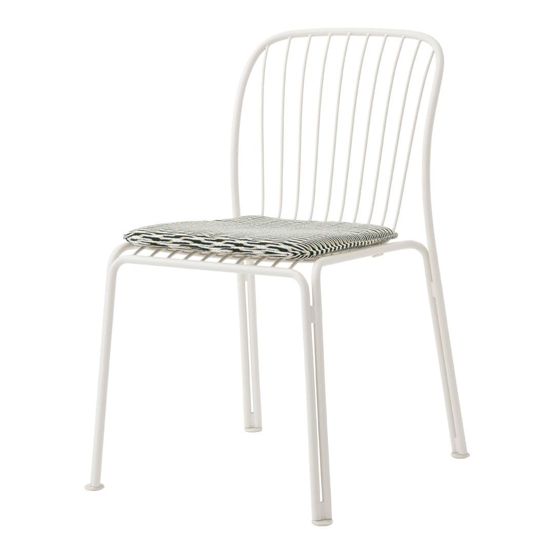 White metal chair with a striped gray cushion for a modern and stylish touch to any space.