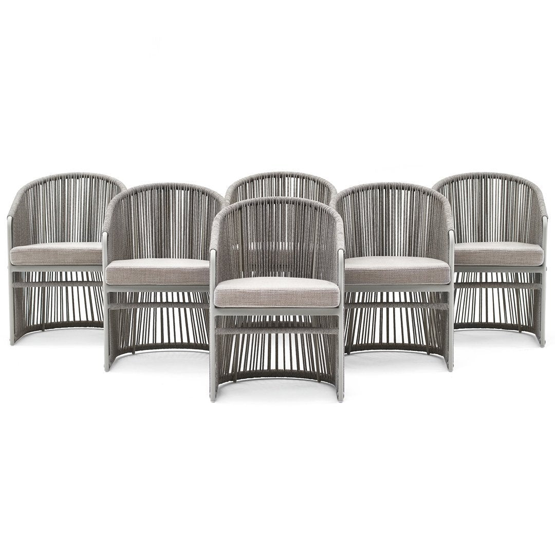 Set of six taupe wicker dining chairs with cream cushioned seats and vertical striped pattern. Perfect for modern decor.