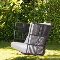 Black metal swing chair with a white cushion, featuring sleek lines and a modern, minimalist design.