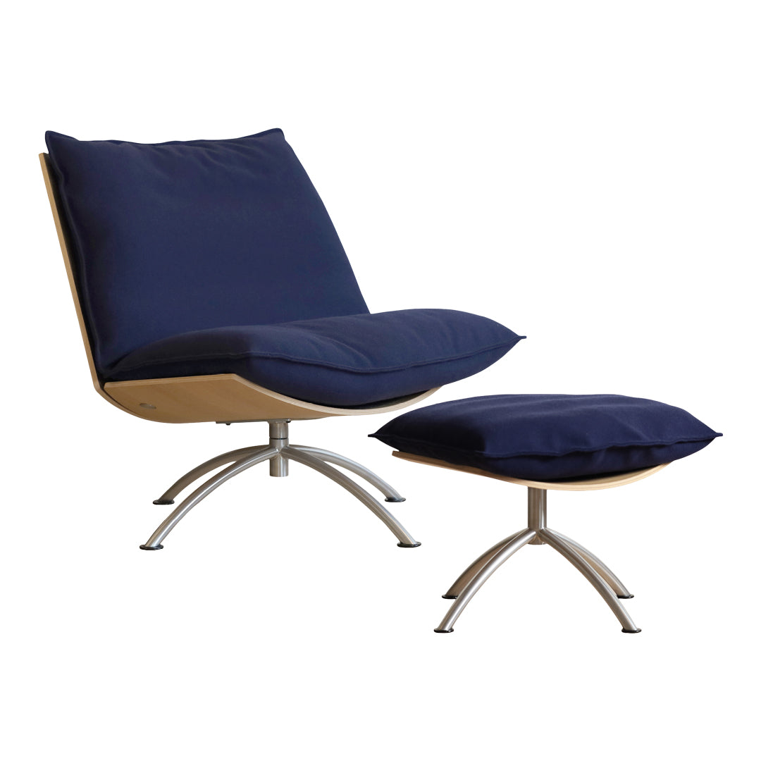 Navy blue fabric lounge chair with matching ottoman, featuring a sleek wooden base and modern metal legs.