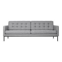 Gray mid-century modern sofa with tufted upholstery and sleek metal legs. Perfect for stylish living spaces.