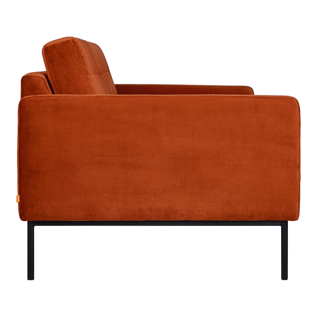 Rust orange velvet sofa with clean lines and a sleek black metal base, perfect for modern décor.
