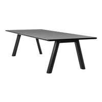 Sleek black rectangular table with minimalist design and tapered legs, perfect for modern interiors.