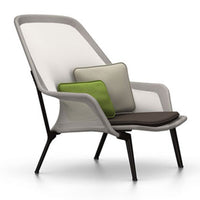 Modern chair featuring a sleek gray and white frame with green and beige cushions, accented by a brown seat.