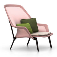 Pink chair with green and dark green cushions, featuring a sleek design and modern patterns. 