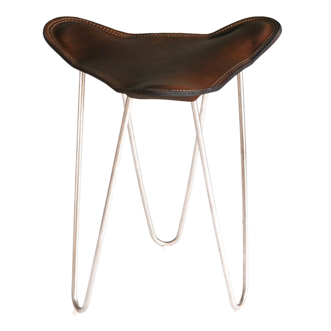 Brown leather stool with a unique shape and sleek silver metal legs, perfect for modern decor.