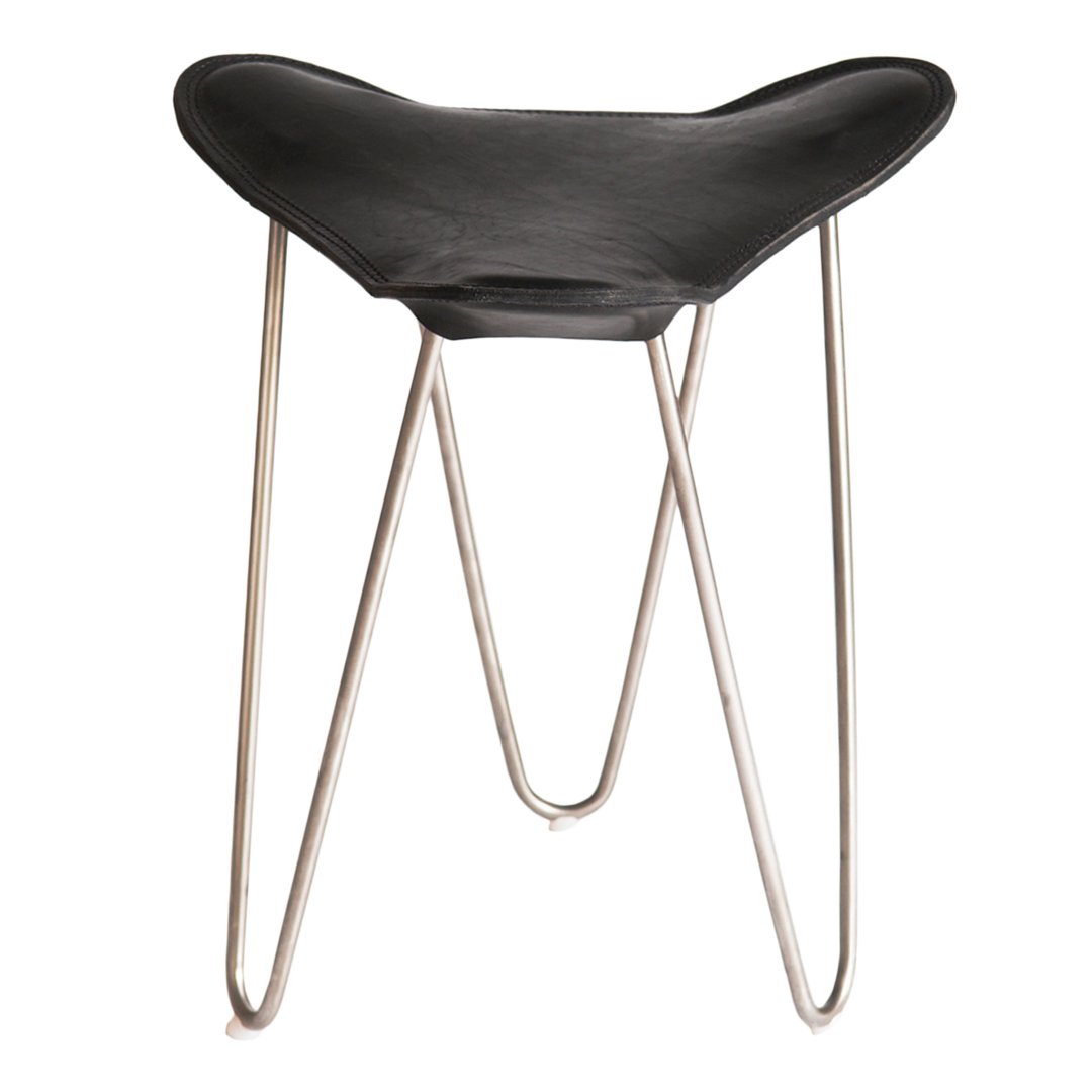 Black leather stool with a unique curved shape and sleek silver metal legs, adding modern elegance to any space.