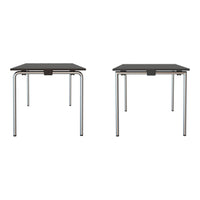 Brown tabletop with sleek chrome legs, featuring a minimalist design and smooth surfaces. Perfect for modern spaces.