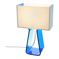 Modern table lamp with a white shade and a vibrant blue base. Stylish blend of colors and geometric design.