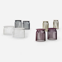 "Set of wire mesh vases in clear, navy, gold, and plum colors, featuring elegant vertical stripes and modern designs."