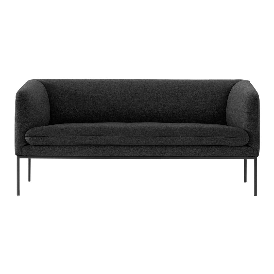 Modern black sofa with a smooth, upholstered finish and rounded arms on sleek metal legs. Ideal for minimalist decor.