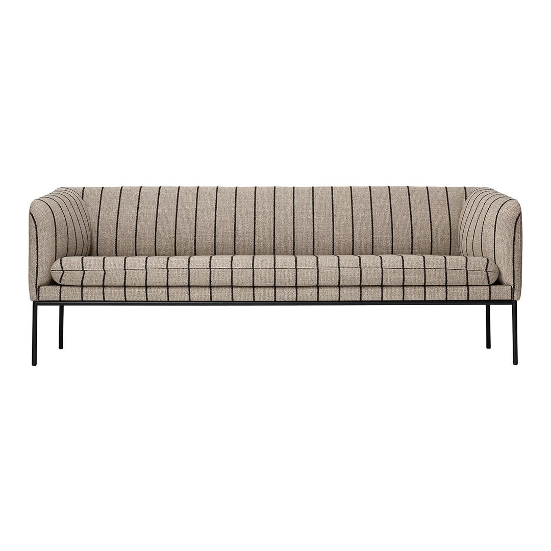 Beige sofa with black vertical stripes against a minimalist metal frame. Ideal for modern decor.
