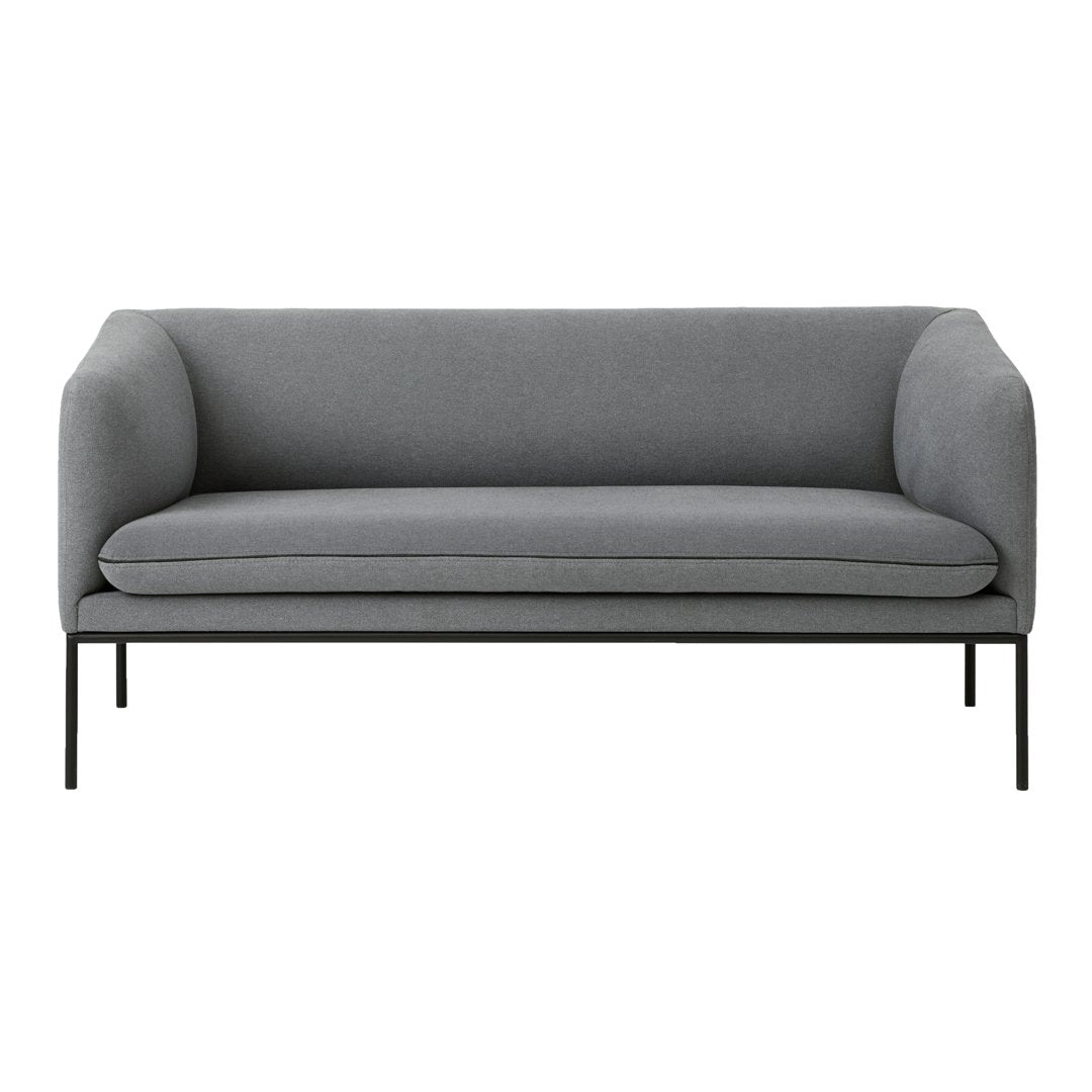 Gray fabric sofa with a minimalist design and black metal legs, perfect for modern interiors.