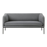 Gray fabric sofa with a minimalist design and black metal legs, perfect for modern interiors.