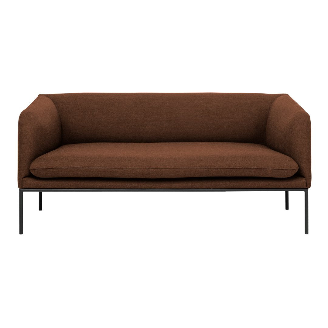 Brown upholstered sofa with a minimalist design and black metal legs, perfect for modern interiors.