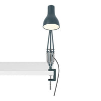 Blue and gray clamp-on lamp with a minimalist design and smooth, matte finish.