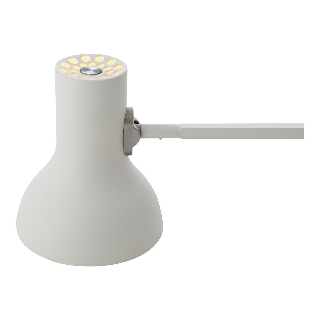 White pendant lamp featuring a smooth, modern design and a patterned yellow LED bulb. Ideal for contemporary decor.
