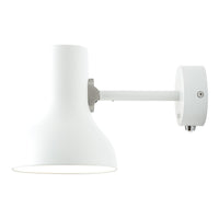 White wall-mounted lamp with a sleek, minimalistic design and smooth finish for a modern aesthetic.
