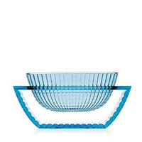 Turquoise glass bowl with pleated design and a contrasting wavy edge base, perfect for decorative use.