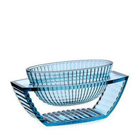 Stylish blue glass bowl with elegant ribbed patterns and a sleek, modern design. Perfect for home decor.