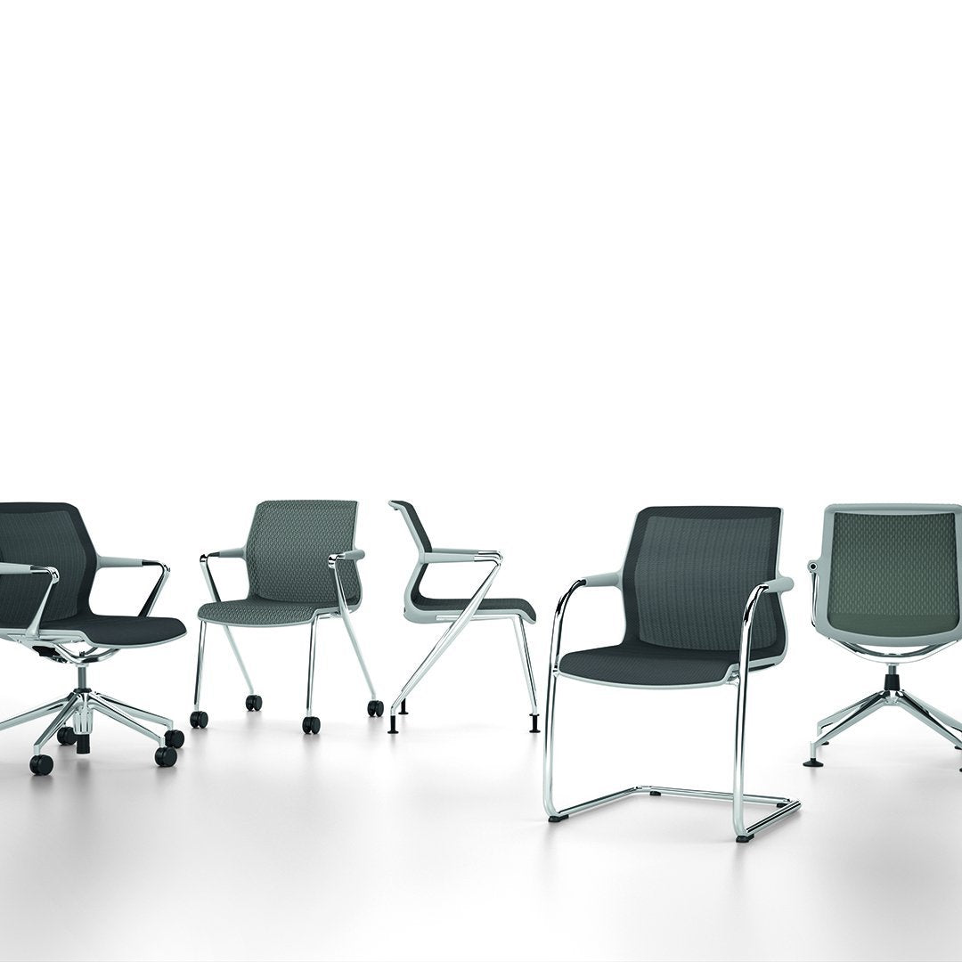 Modern office chairs in various shades of gray with sleek chrome accents and simple geometric patterns.