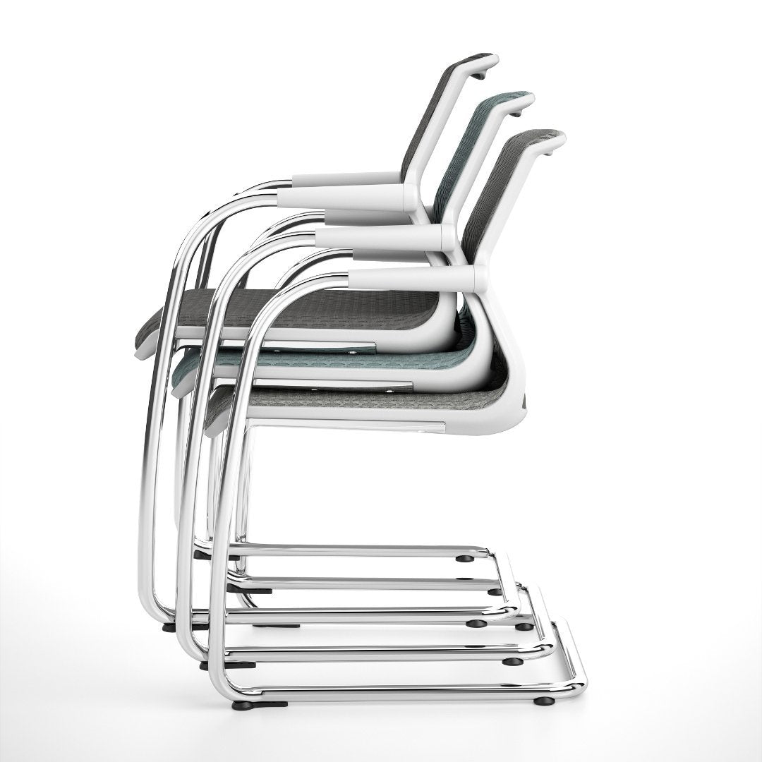 Stacked modern chairs in white and gray with sleek metallic frames, featuring minimalist design and clean lines.