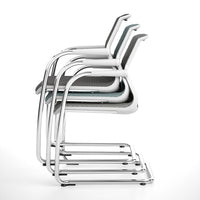 Stacked modern chairs in white and gray with sleek metallic frames, featuring minimalist design and clean lines.