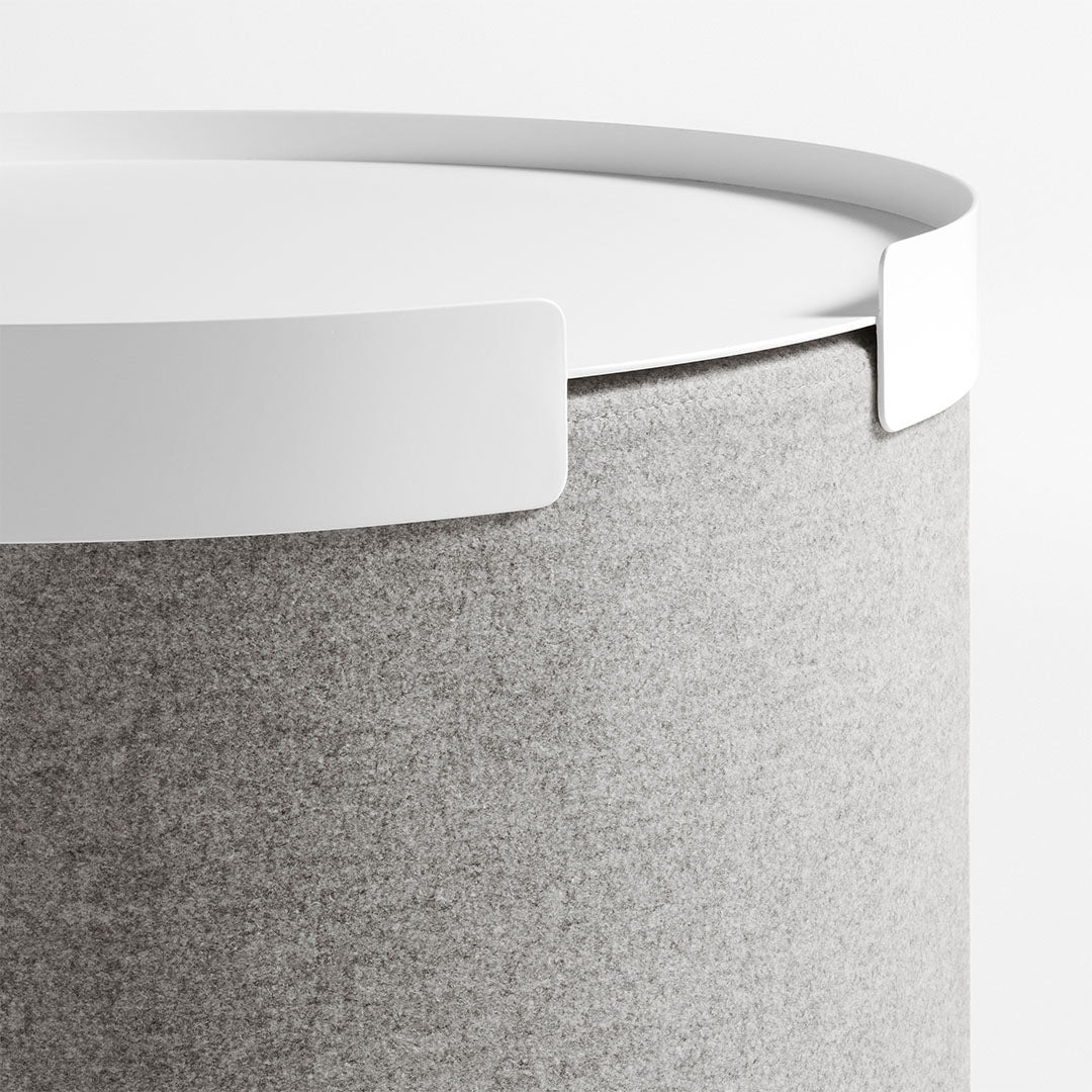 Gray felt storage container with a sleek white lid, featuring a modern, minimalist design.