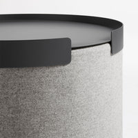 Gray felt storage container with a sleek black lid and minimalist design. Ideal for modern decor.