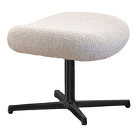Cream-colored boucle ottoman with a smooth, rounded design and black metal base. Modern and stylish accent piece.