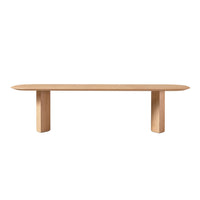 Light oak wood bench with a smooth, oval top and minimalist cylindrical legs. Natural finish, no distinct patterns.