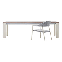 Sleek white and gray dining table with a warm wood top and a textured gray chair, perfect for modern spaces.