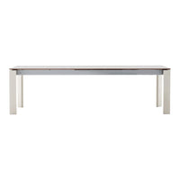 Modern wooden dining table in light beige with a smooth white tabletop and minimalist design. Ideal for any decor.