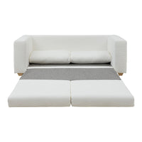 White sofa bed with gray accent cushions and a matching gray fold-out section for versatile styling.