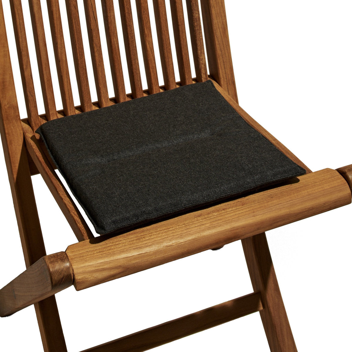 Black square cushion on a wooden chair, showcasing a sleek, solid color for a modern look.
