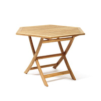 Light brown wooden hexagonal folding table with a slatted top design. Perfect for outdoor or indoor use.