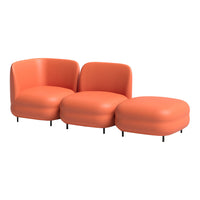 Modern orange seating set with curved shapes and smooth, matte finish, perfect for contemporary interiors.