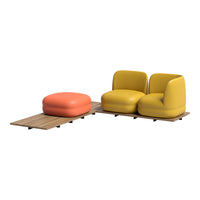 Bright yellow and orange modern seating with a sleek wooden base, featuring smooth, rounded forms and vibrant colors.