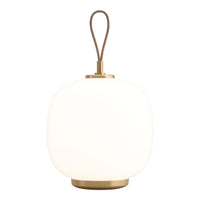 White globe pendant lamp with brass accents and a leather handle. Minimalist design for modern decor.