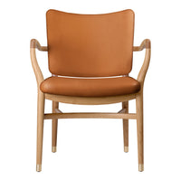 Tan leather seat and backrest with light wood frame, featuring minimalist design and gold accents.
