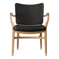 Black leather upholstered chair with natural wood frame and gold accents, featuring a sleek, minimalist design.