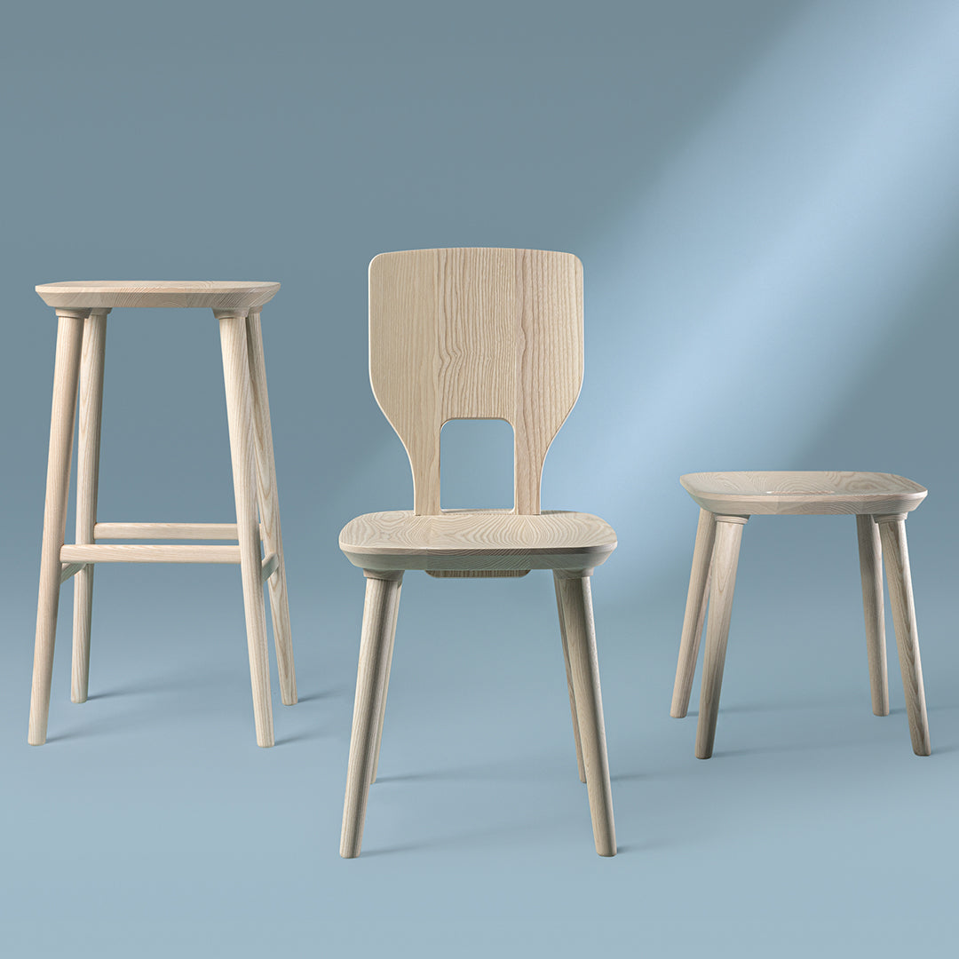 Light wood furniture set featuring a stool, chair, and side table against a soft blue background. Clean lines, minimalist design.