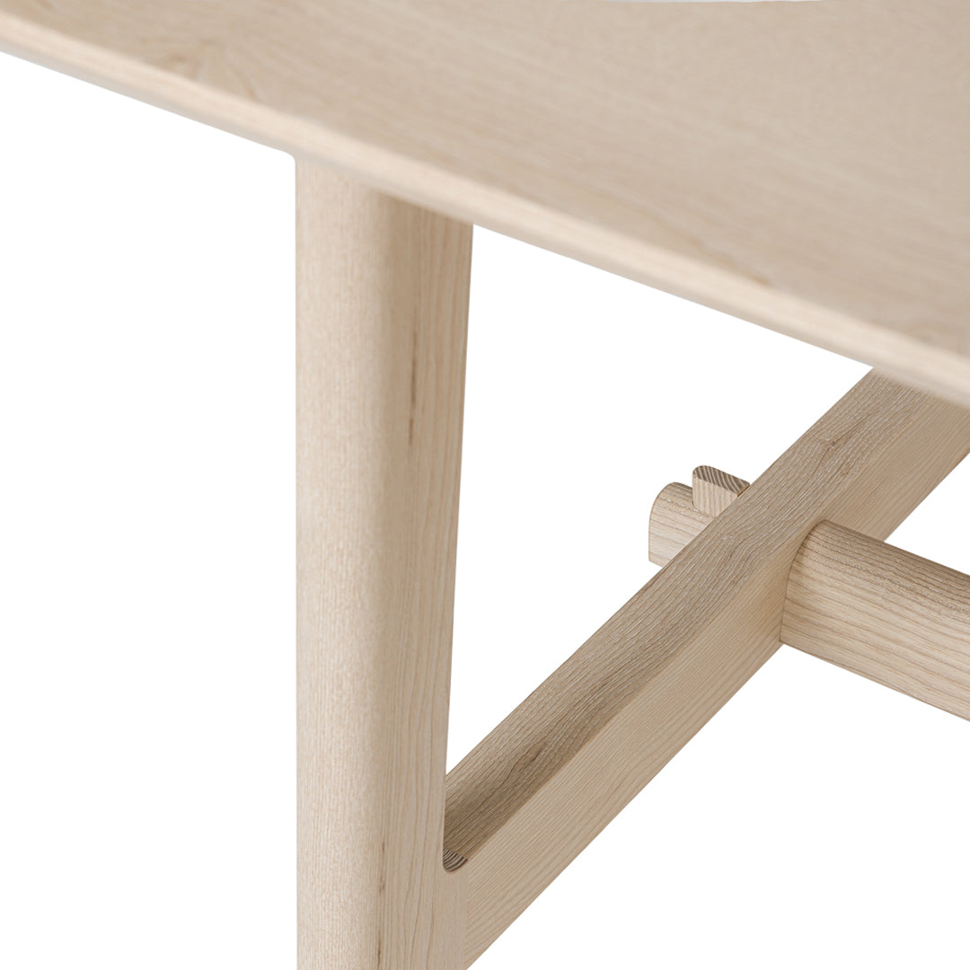 Light natural wood with smooth finish, showcasing minimalist design and clean lines. Perfect for modern decor.