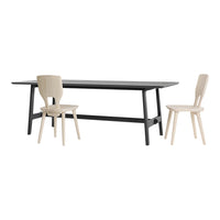 Modern black dining table with minimalist beige wooden chairs, showcasing a sleek and neutral color palette.