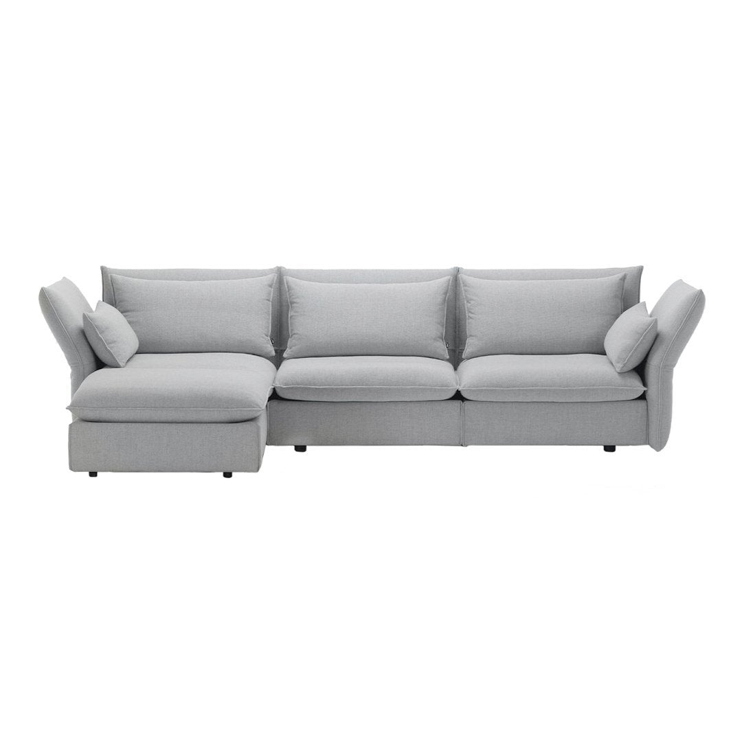 Light gray sectional sofa with plush cushions and sleek design, perfect for modern living spaces.