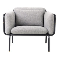 Gray upholstered chair with soft cushions and sleek black metal frame, featuring minimalistic design and contemporary style.