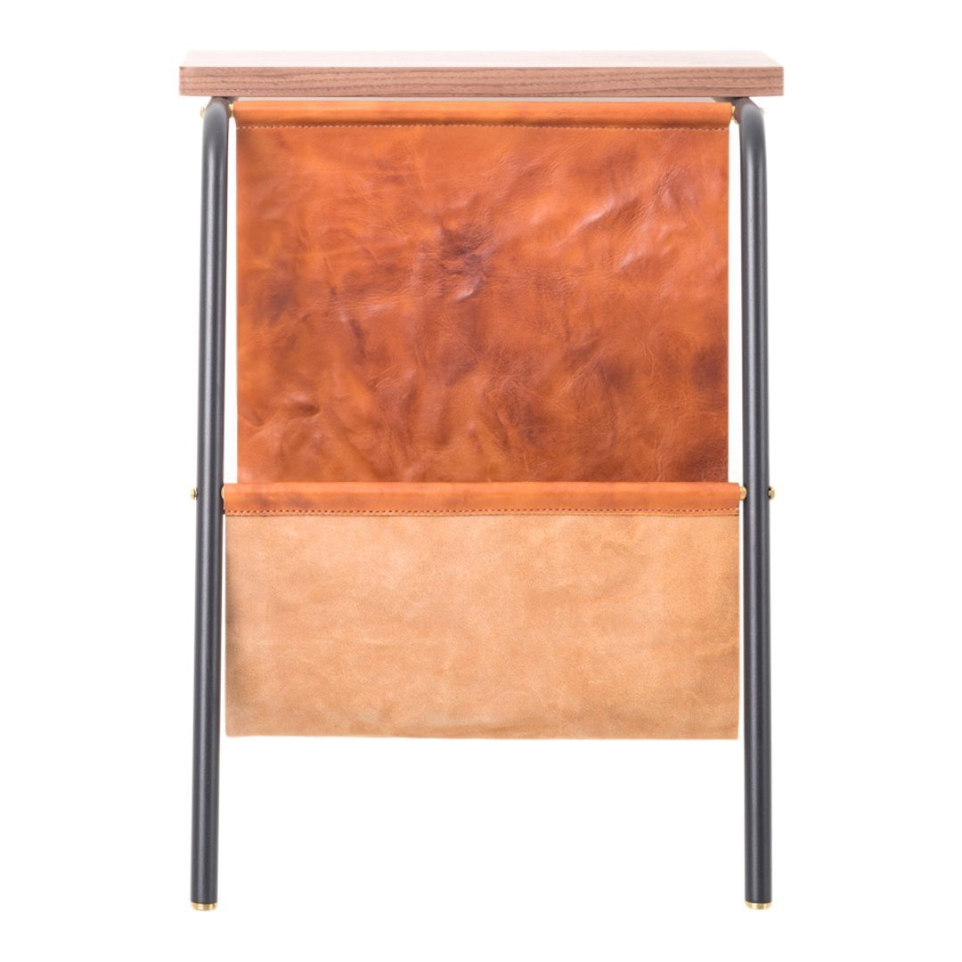 Rust-colored leather with tan accents and sleek black metal legs. Contemporary design, warm earthy tones.