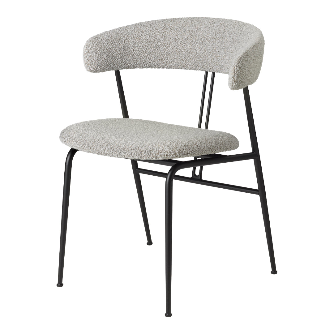 Gray upholstered chair with a textured surface and sleek black metal legs, featuring a minimalist, modern design.