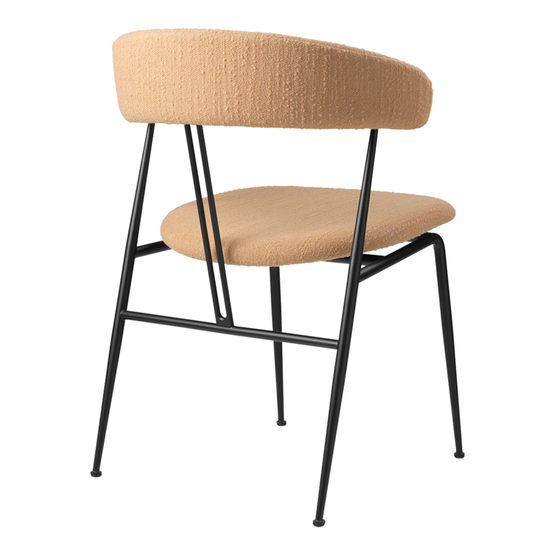 Beige upholstered chair with a minimalist black metal frame, featuring a smooth, contemporary design.