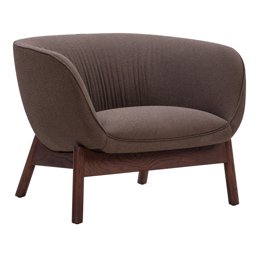 Brown fabric accent chair with a textured pattern and dark wooden legs, offering a modern and cozy aesthetic.